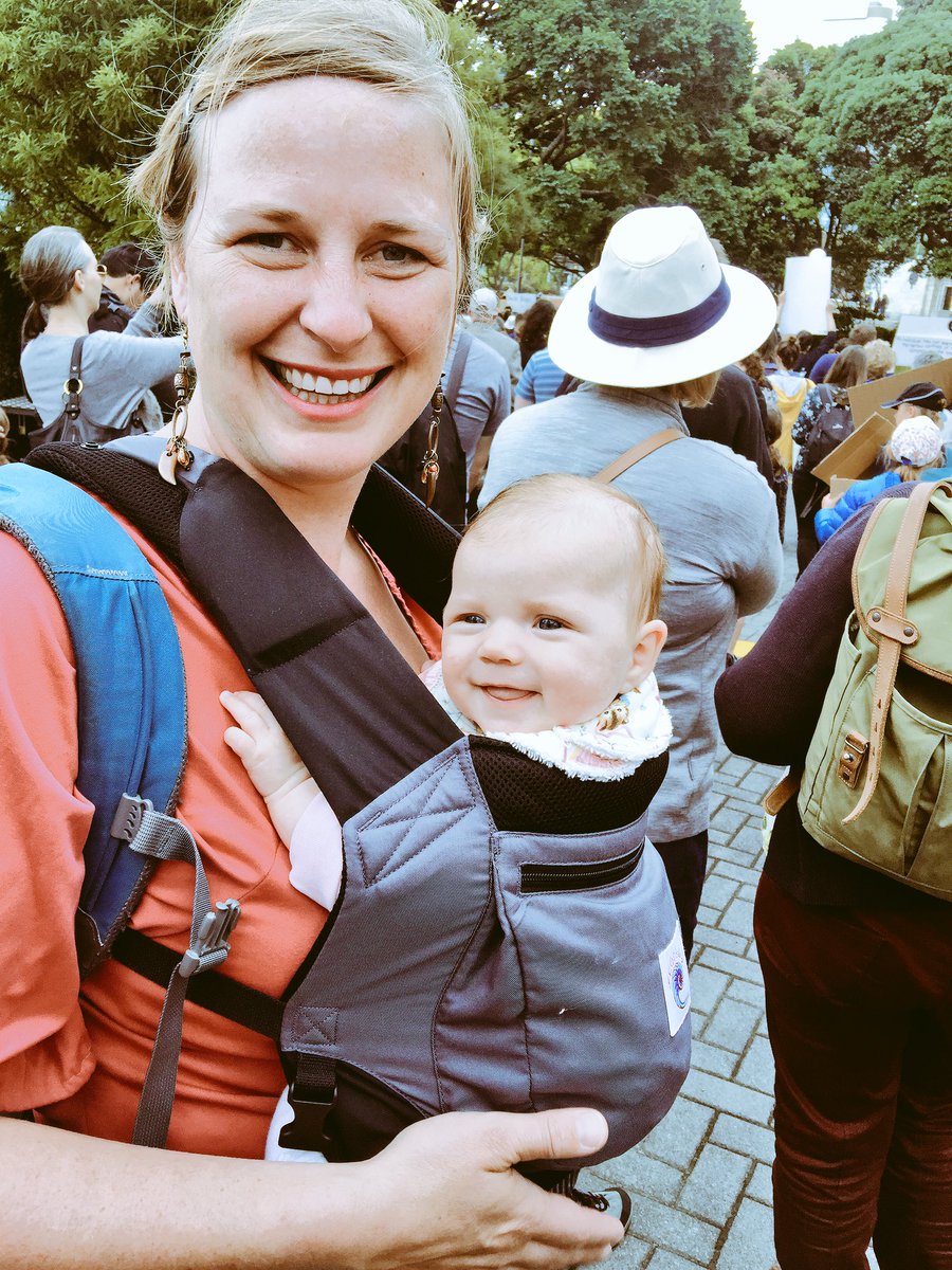 JulieAnneGenter's tweet photo. This is Shirley. She's half American, half Kiwi. At 3 months old, this is her first march. #WomensMarchOnWashington #WMWelly #solidarity https://t.co/gByq0L1hVT