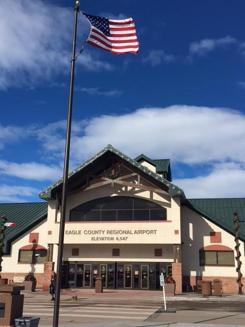 EGEairport's tweet photo. The flag is flying and the skies are blue. Another great day at EGE! #FlyVail  #flyEGE https://t.co/vg8hiA8E8t