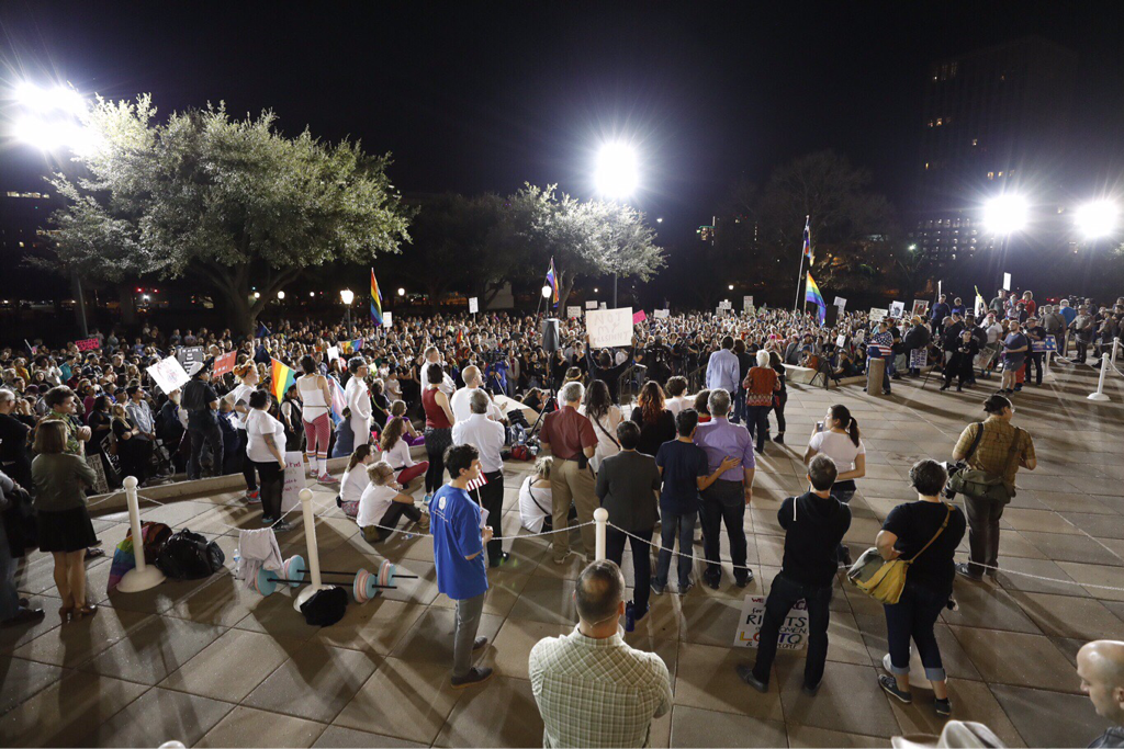 TexasTribune's tweet photo. There is a large crowd at the Texas Capitol, where LGBT activists are demonstrating. Photos by Bob Daemmrich. #txlege #TXinauguration https://t.co/M0mi3vMQ8h
