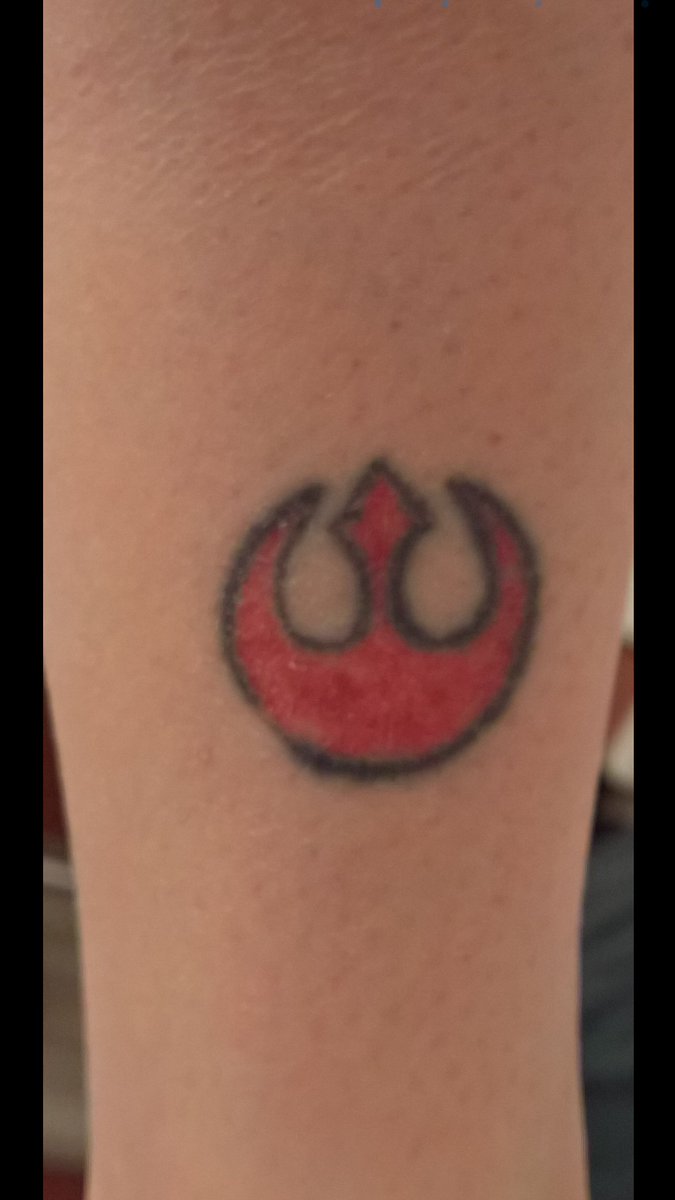 GinaMultipass's tweet photo. This tattoo is old and fading, but I'm as proud today as I was when I got it over a decade ago. May the Force be with us. #TheResistance https://t.co/qr0zmWFfAH