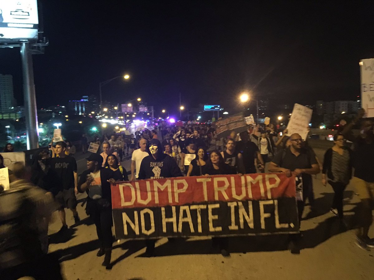 tomaskenn's tweet photo. Marching through Downtown Miami to #resist & #oppose Donald J. Trump. https://t.co/97Mrsx7A3E