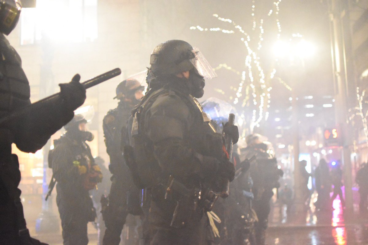 dougbrown8's tweet photo. Riot cops tear gas protesters (and me) https://t.co/ls8iJ8iUaf