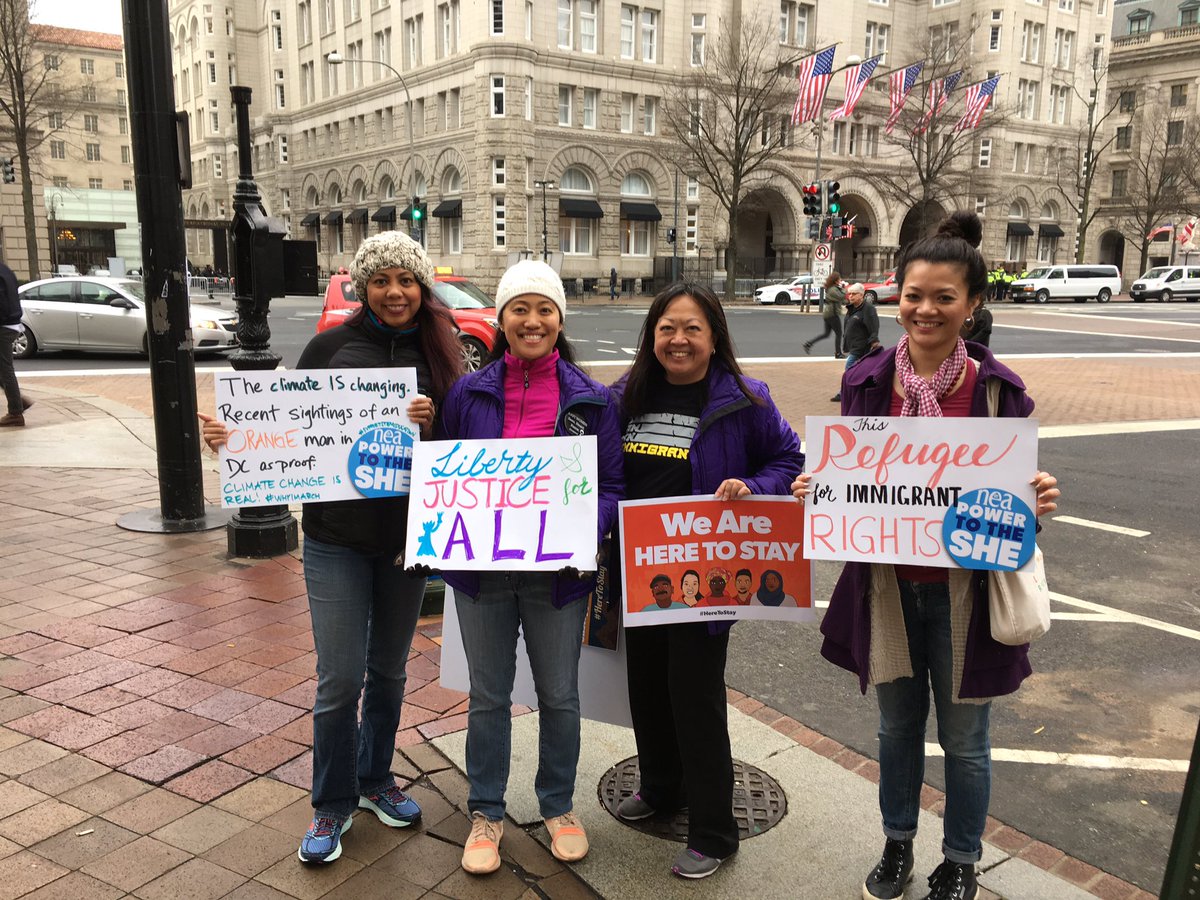 maritaetc's tweet photo. Check out our backdrop! #HereToStay #WomensMarch https://t.co/9P1Fl1mSfH