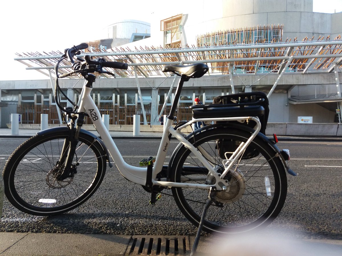 Beautiful weather for a bike tour in Edinburgh today. Here we are with one of our ebikes at the Scottish Parliament
