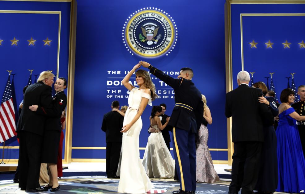 VOANews's tweet photo. In photos: With #inauguration done, President Trump celebrates at balls. #voainaug https://t.co/LzS9nI76x3