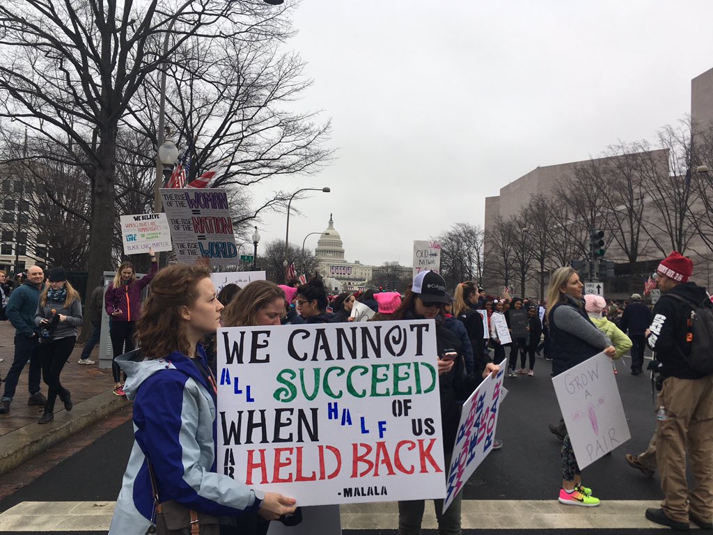 The Capitol is still decorated for #Inauguration, but the streets belong to the #WomensMarch.