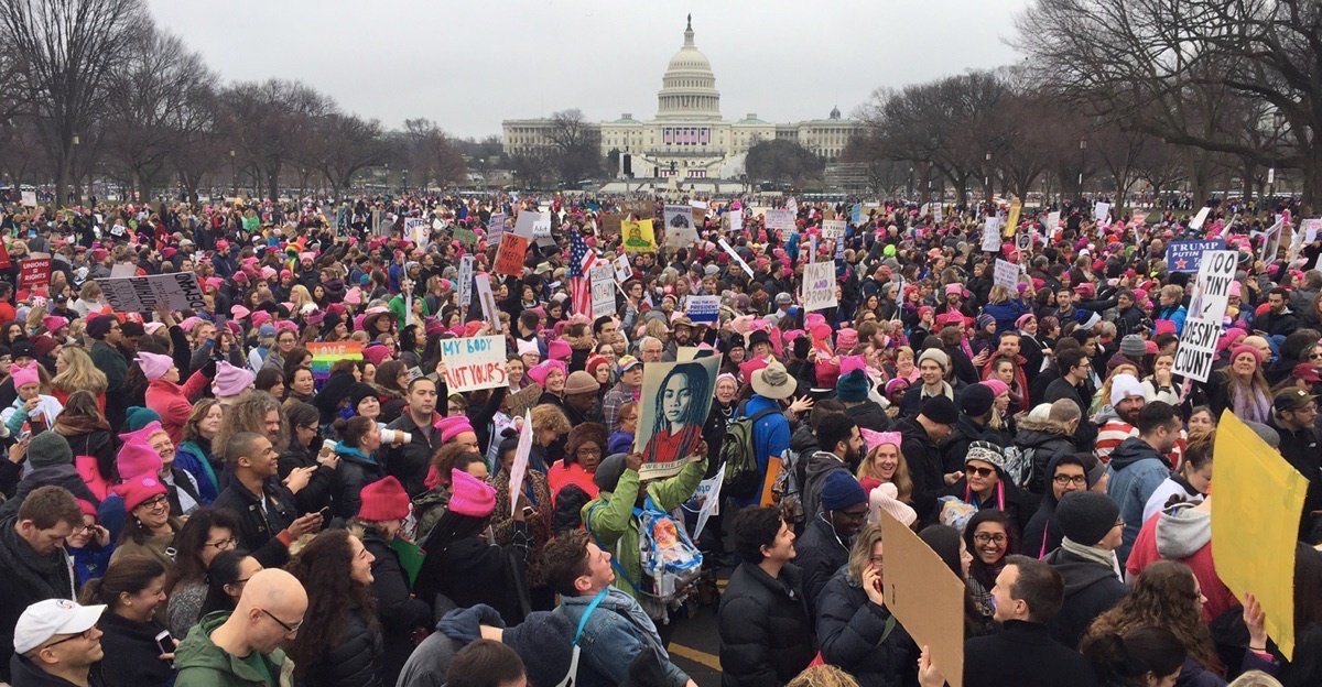 Upworthy's tweet image. 31 powerful #WhyIMarch tweets from the thousands of people protesting at the #WomensMarch. 🙌 u.pw/2jjlLcG