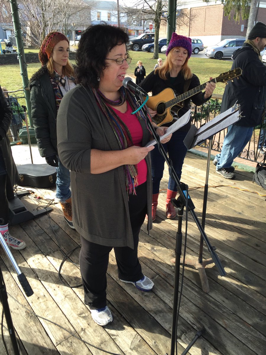 Rally ends with we shall overcome.