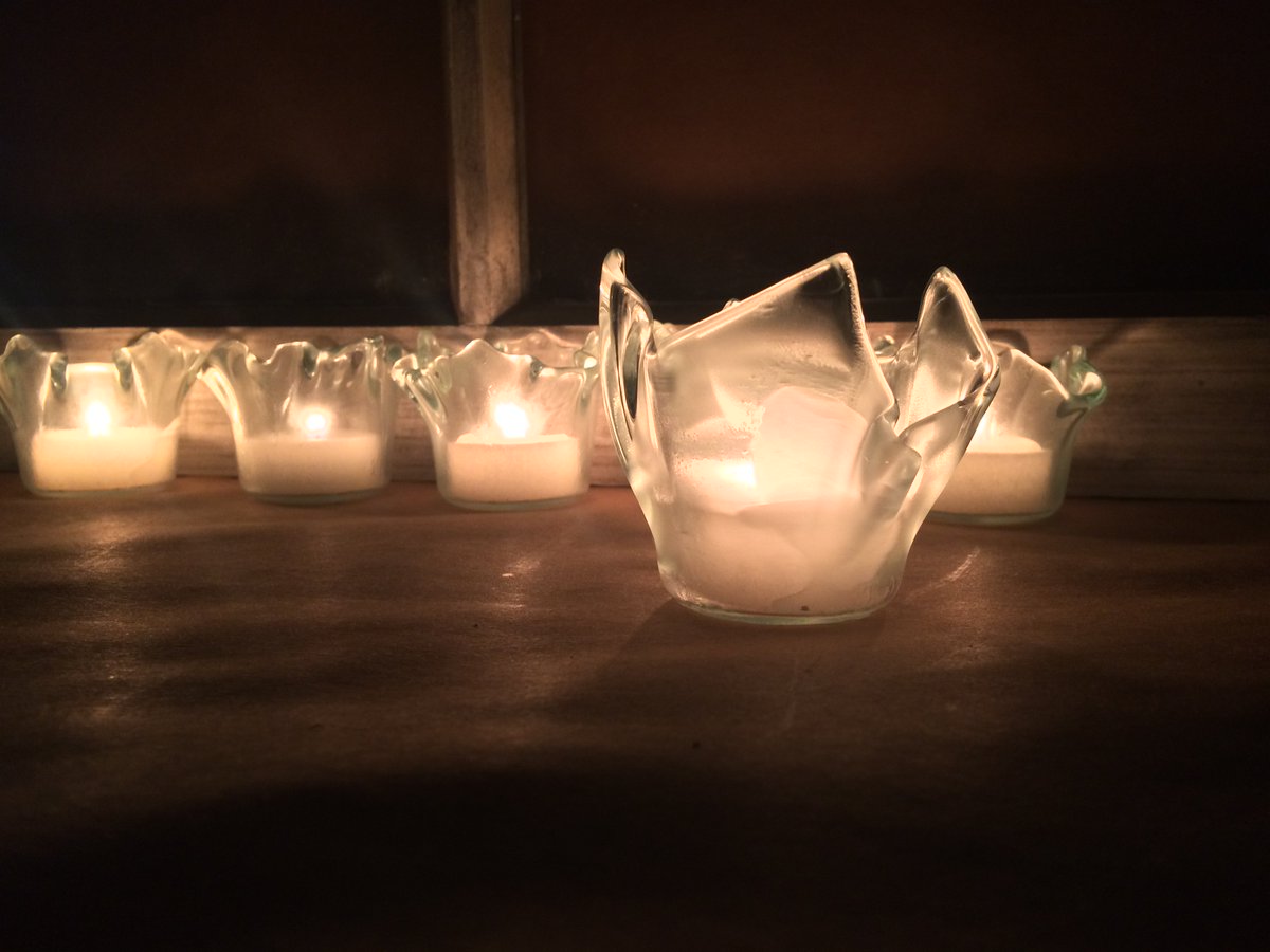 Playing with light at NOMAglass - tealights from recycled glass wine bottles.  Get yours at ow.ly/KCBv308e2bZ