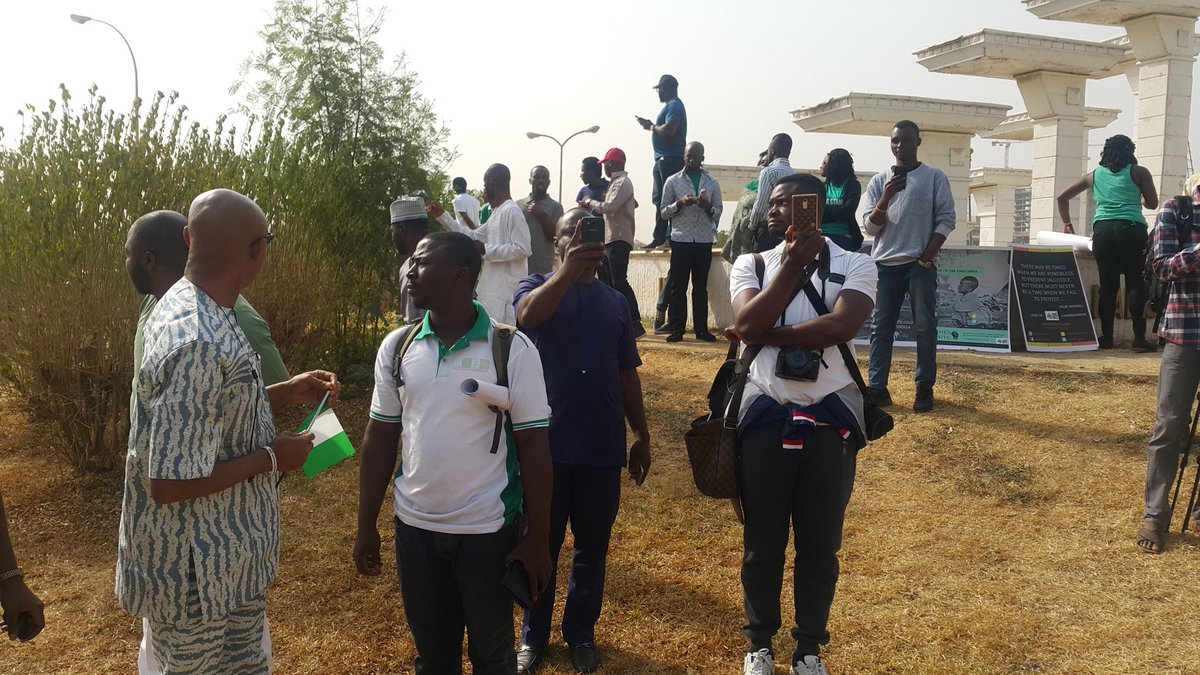 MKabrik's tweet photo. We are at Unity Fountain right now getting ready for our protest 
#IStandWithNigeria 
#OneVoiceNigeria https://t.co/2rd5Hn7kOQ