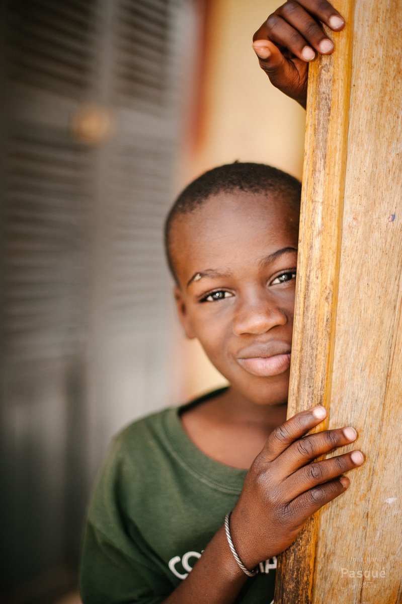 #Portrait of a #child from Saint-Louis (#Senegal). In background you can see magnificent wooden shutters typical of the #colonial period.