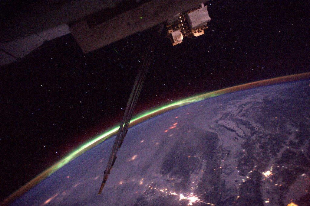 Thom_astro's tweet photo. After 2 months in space, I saw my first aurora! Magical green lights in the distance. Always something to look forward to on @Space_Station https://t.co/oQW3zooBCs
