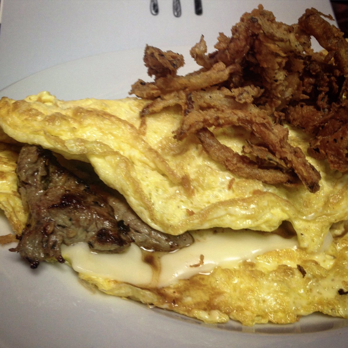 2HomeCooks's tweet image. Go #patriots! Tom Brady #omelette: #steaktips, American cheese, topped w/ fried #onionrings
