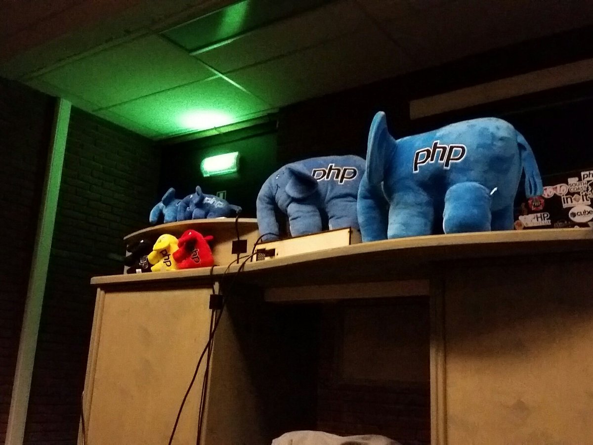 PHP_FOSDEM's tweet image. The very first, original blue prototype elephpant is assisted by the Belgian elephpant squad in the PHP room. #fosdem #phpfosdem