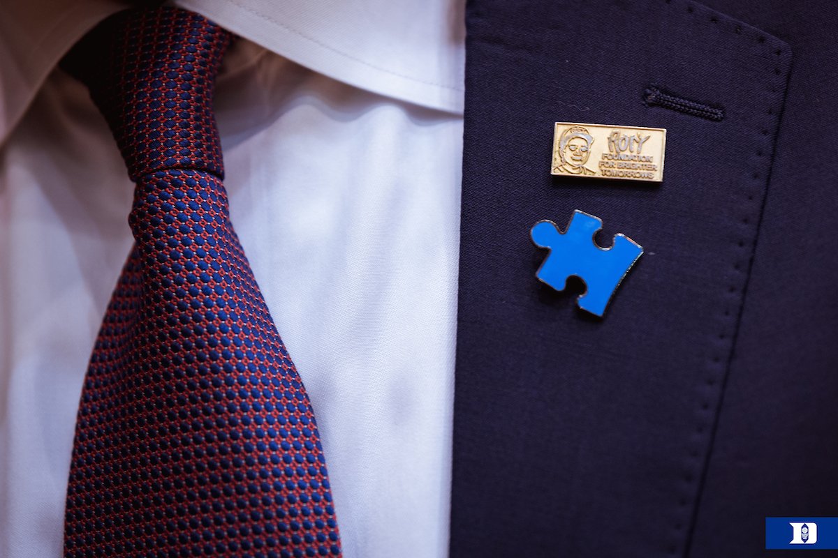 Our coaches are proud to wear this pin today in support of Coaches Powering Forward for Autism #AutismHoops