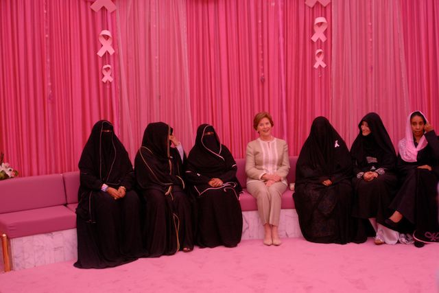 greta's tweet photo. Laura Bush in Saudi Arabia 2006 -look at how these women are forced to dress (I took this pic in a tent that was lighted in pink) https://t.co/hcVe2l1Qeh