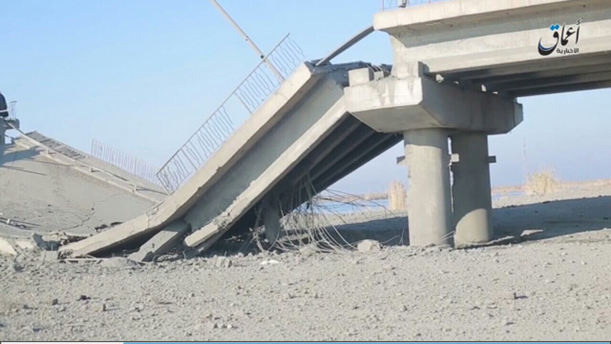 C___News's tweet photo. #Syria
#IslamicState's #AmaqAgency Release Video Shows Aftermath Of #US Airstrike On Maghlah Bridge W Of #Madan Town, #Raqqa. https://t.co/pbpUrz7jg2