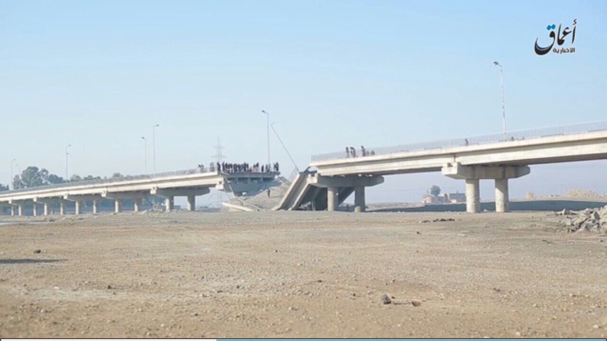 C___News's tweet photo. #Syria
#IslamicState's #AmaqAgency Release Video Shows Aftermath Of #US Airstrike On Maghlah Bridge W Of #Madan Town, #Raqqa. https://t.co/pbpUrz7jg2
