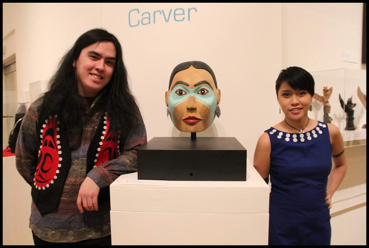 NativeJeweler's tweet photo. Ellena & Edwin with a portrait mask of their grandmother, Ellen Neel, carved by dad #nativeAmerican #nativeIndianArt https://t.co/mXhx2yuFyg