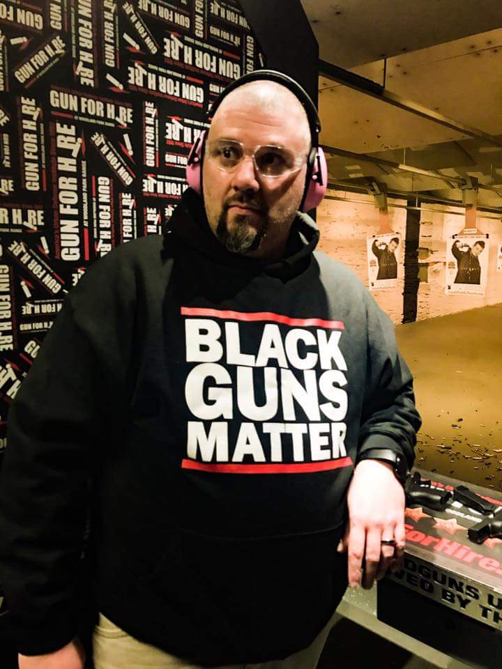 baseman2001's tweet photo. Helping 1st time shooters at a recent event wearing my daughters ear muffs lol. #DiversityShoot #BlackGunsMatter #GunForHire #HispanicsFor2a https://t.co/0tiLtCFXFp