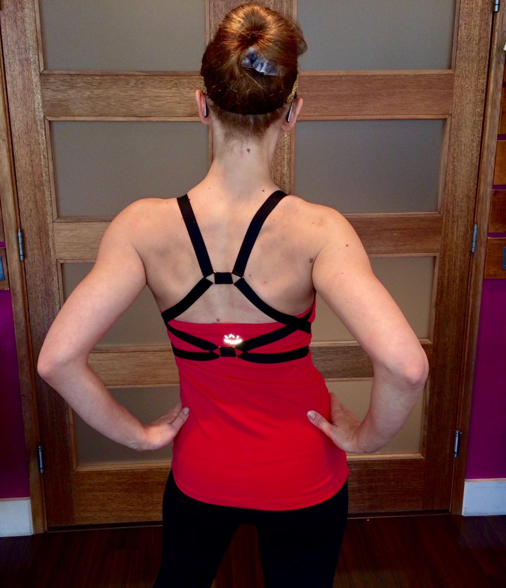 Kristen Z. is showing off her shoulders AND our new "Live Free or Tie Hard" tank by Beyond Yoga. Get yours at our Littleton boutique!