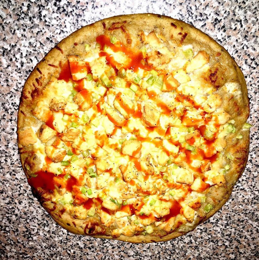 thom_sparks's tweet photo. Thom's Bar and Grill. On Super Bowl Sunday's we make pizza! Buffalo Chicken. #49 #bangbang… https://t.co/kaO4Kk1Flu https://t.co/yP4VP03d0b