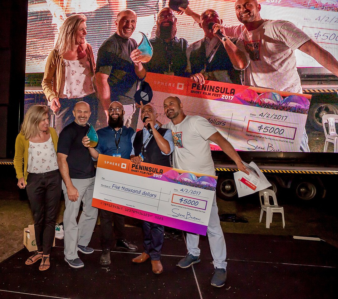 TheSphereAgency's tweet photo. Winner! Nathan Loves Ricky Martin by @StevenArriagada ! Here is Sphere MD Michael Abdel presenting the cheque! @PenShortFilm #PSFF #film https://t.co/kMqUEHjOHG
