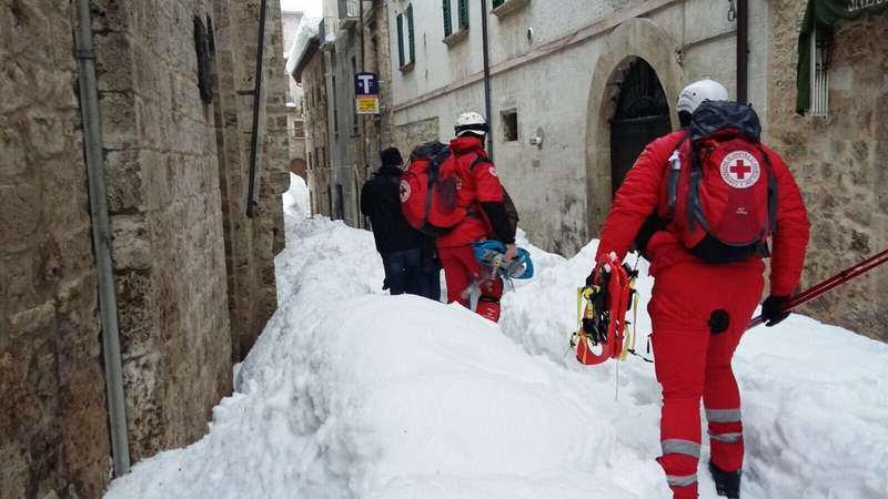 ifrc's tweet photo. A group of refugees have joined @crocerossa teams fighting to reach #ItalyAvalanche victims. Read more: https://t.co/r5xtEe7qC6 #ItalyQuake https://t.co/ZvBdCBqwOb