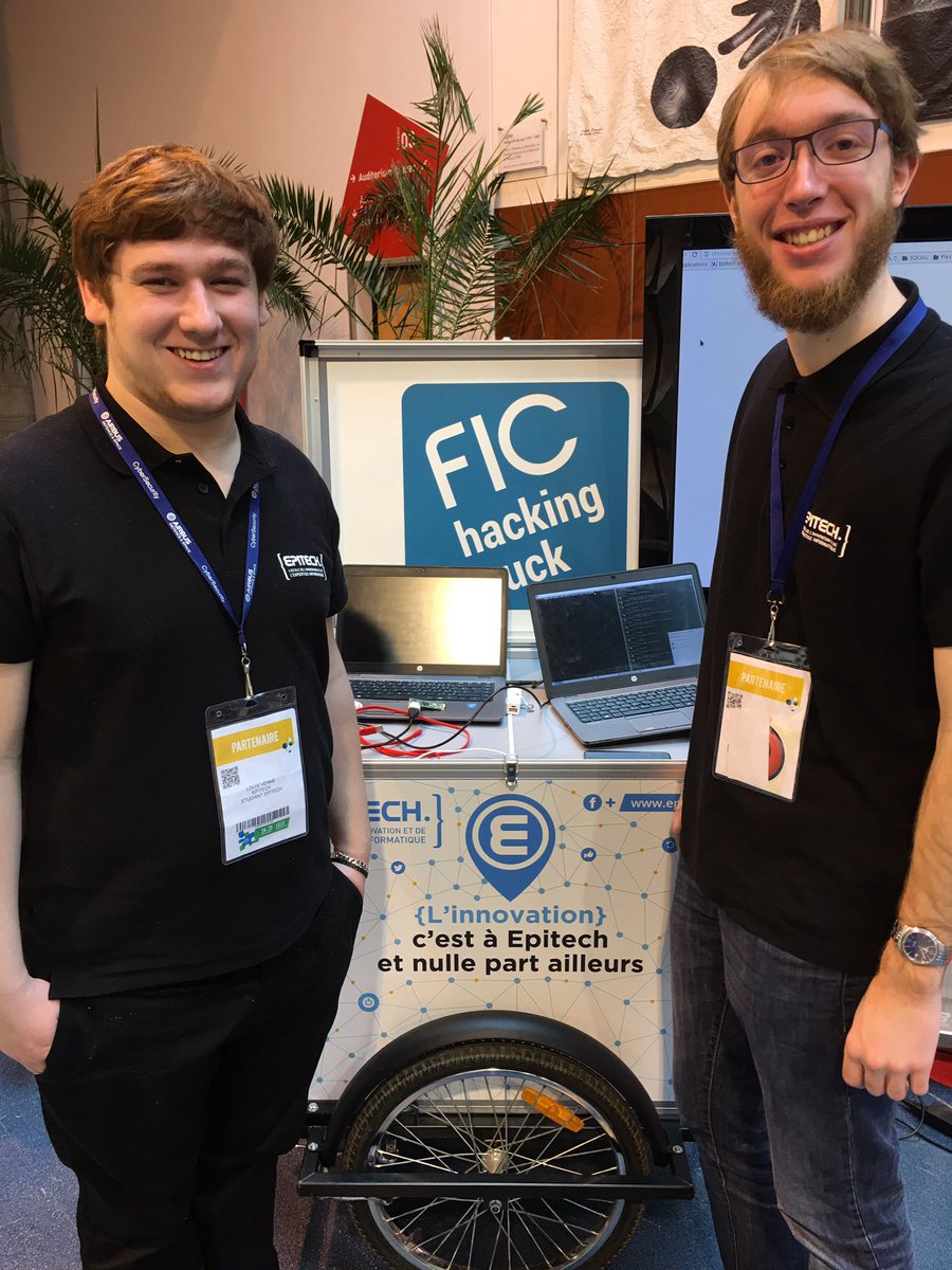 Epitech's tweet photo. Louis et Benjamin d'@EpitechNantes animent eux le 2eme hacking truck du #FIC2017 sur le #poisontap https://t.co/o1boItA8eS