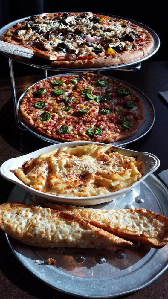 PaliosRowlett's tweet photo. The “Sharing is Caring” rule doesn’t go together with our lip smacking range of items. Hit like to agree more!! #Foodie #PaliosPizza https://t.co/ehEnMnPeFn