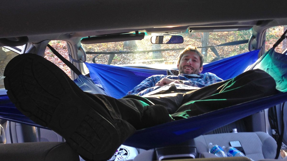 Gizmodo's tweet photo. A hammock for your car gives you a cheap home if the apocalypse ever comes https://t.co/j5lAVXDOpt https://t.co/2X9o47Nc5w