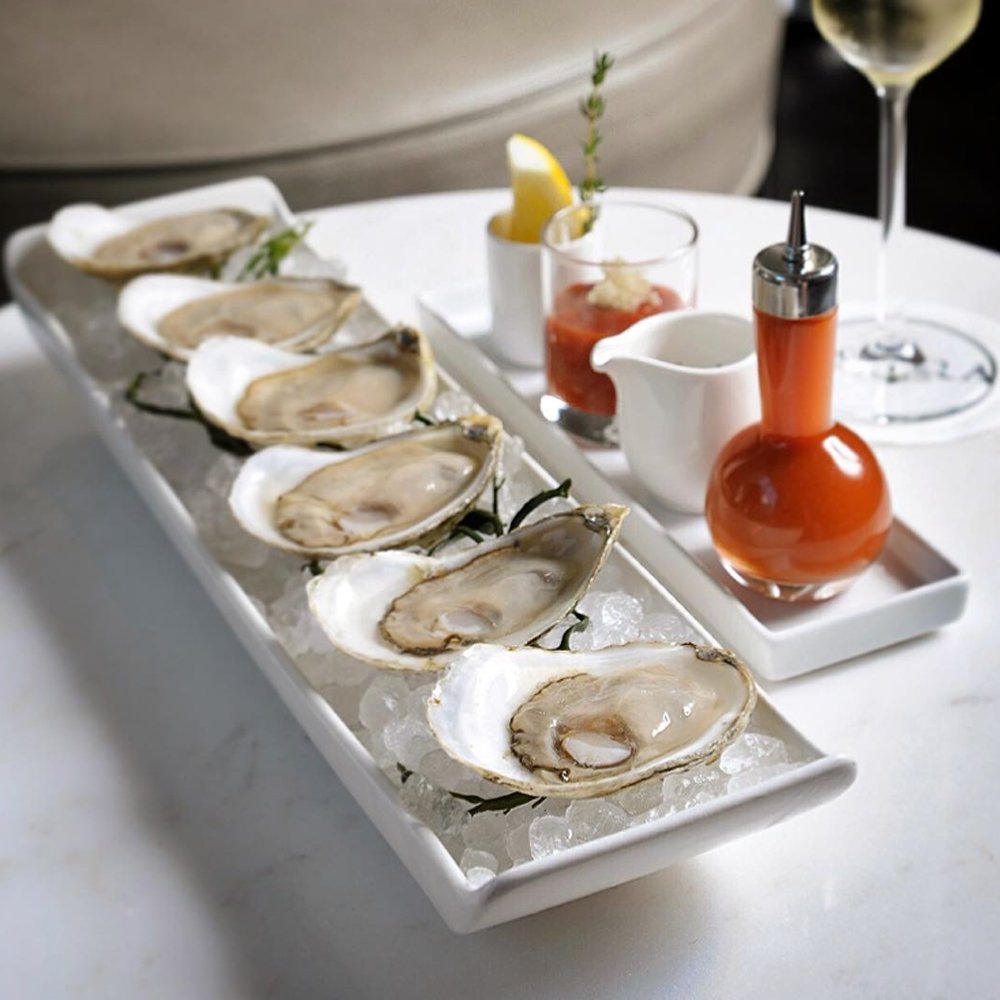 OstraBoston's tweet photo. Enjoy our fresh selection of East Coast oysters with classic accompaniments! (photo credit: @necuisine) https://t.co/3HH6HJCxgo