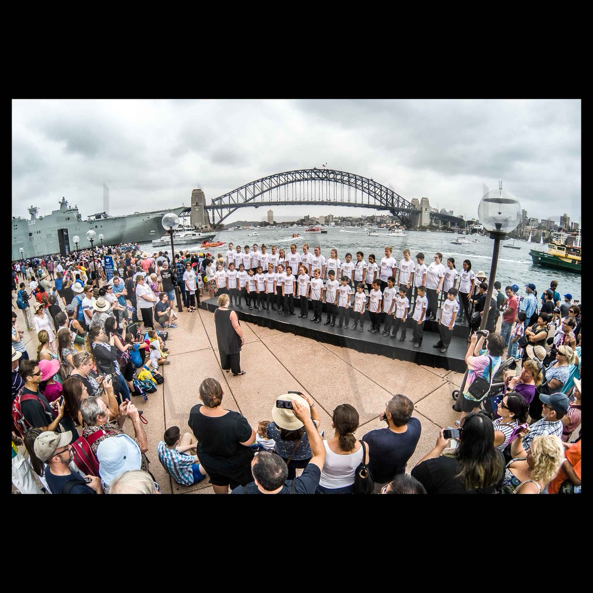 Choir sings National Anthem during 'Salute to Australia' at <a href="/SydOperaHouse/">Sydney Opera House</a> #AustraliaDay #AusDaySyd