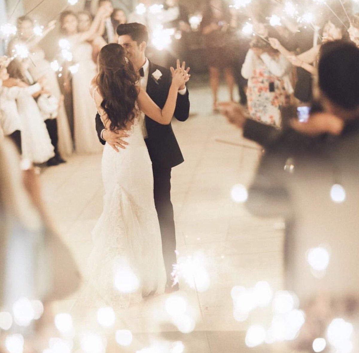 stevenlamphoto's tweet photo. Loving this image captured by @kelseaholderphoto repost from @greenweddingshoes #weddinginspiration #weddingreception #firstdance #sparklers https://t.co/KY8zCQt9IQ