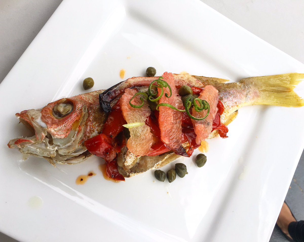 Another fish dish from today's DannyPasta lunch. I have my eye on you.Huss fish with capsicum cooked in arak, with capers, grapefruit &amp; lime