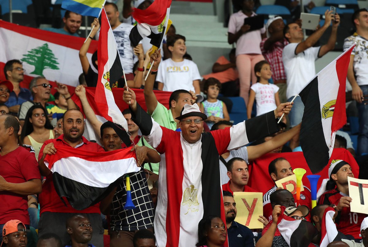BackpageMedia's tweet photo. And the crown goes mad! Egypt fans support to their squad vs Uganda #AFCON #gabon2017 Photographer: Chris Ricco from @BackpagePix #AFCON2017 https://t.co/cxajvFcpDl