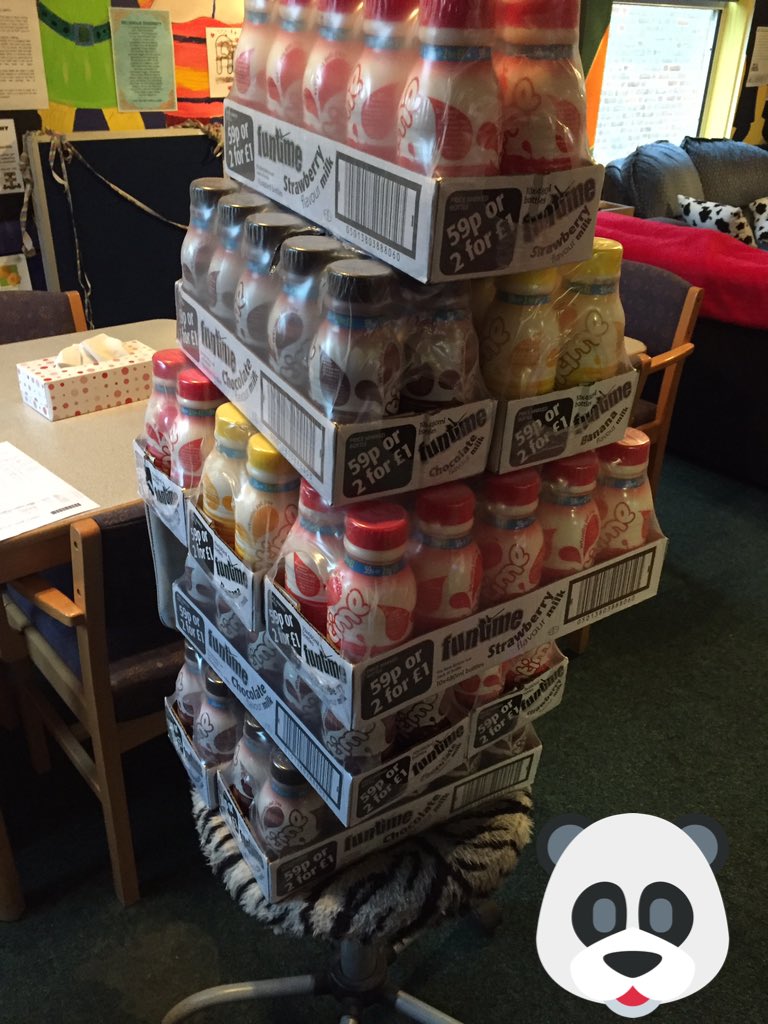 JonneyLeo's tweet photo. Milkshake pyramid, sorting the tuck for FFY using a makeshift office chair/trolley https://t.co/2rtFL7g1Se