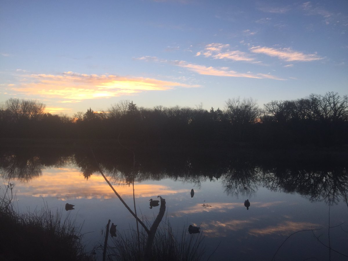 XploreWild's tweet photo. Sunrise over decoys with water that's smooth as glass this morning. #Sunrise #duckhunting #hunting #XploreWild https://t.co/L19lXZNlOu