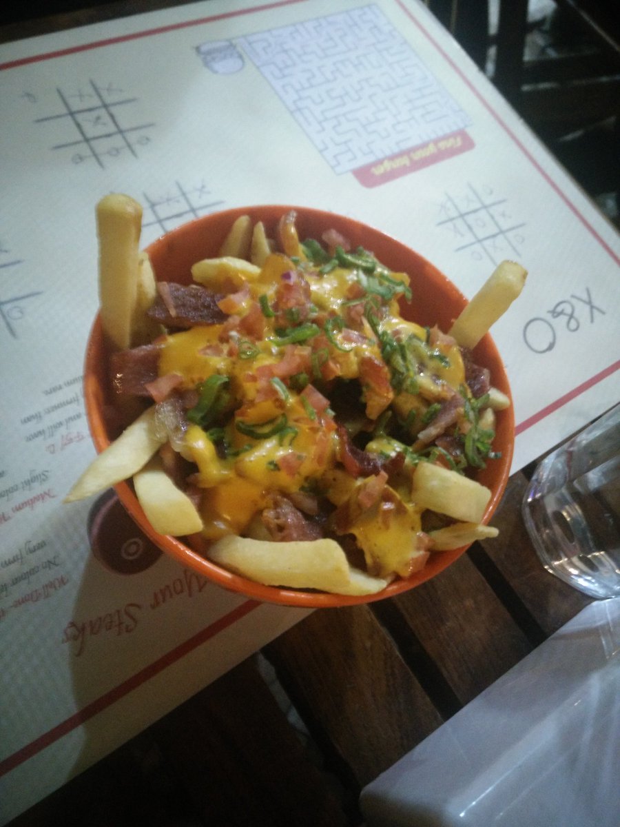 JhelumG's tweet photo. After a #YummyYummy dinner at #StacksAndRacks with #steak , #ribs And #Poutine with #bacon and #cheddar
The #carnivor in me is quite happy😻 https://t.co/ASjk2bMIyt