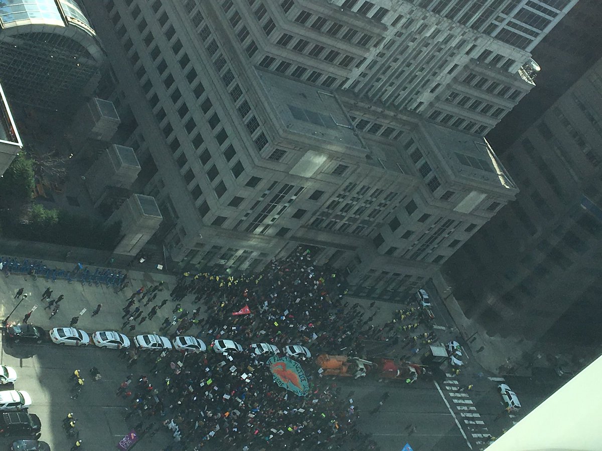 RoJoKnows's tweet photo. Protests in Philadelphia outside of the Bank of NY Mellon building - shut the whole street down https://t.co/oQ6cGWUYuL