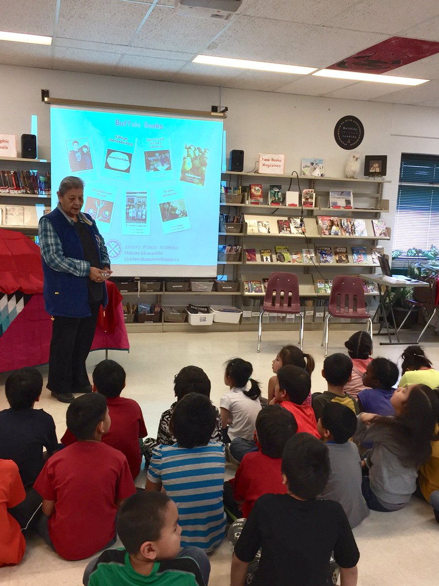 RegPublicSchool's tweet photo. Grandma Bear talks to the students @Albert_School at the launch of the Cree translation of the Buffalo Books. https://t.co/nUKdgCsl9a