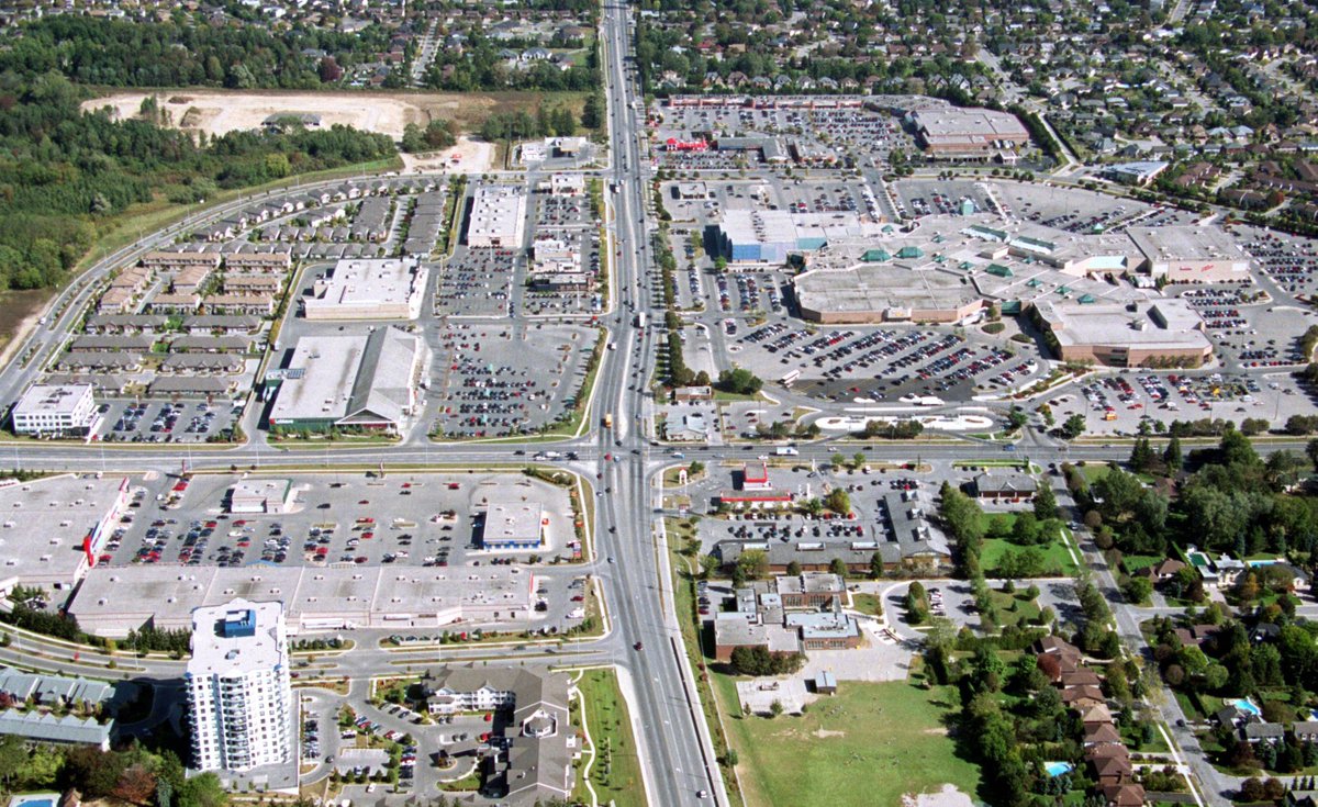 Free press aerial shots of masonville place, from 1986 and 2004. see