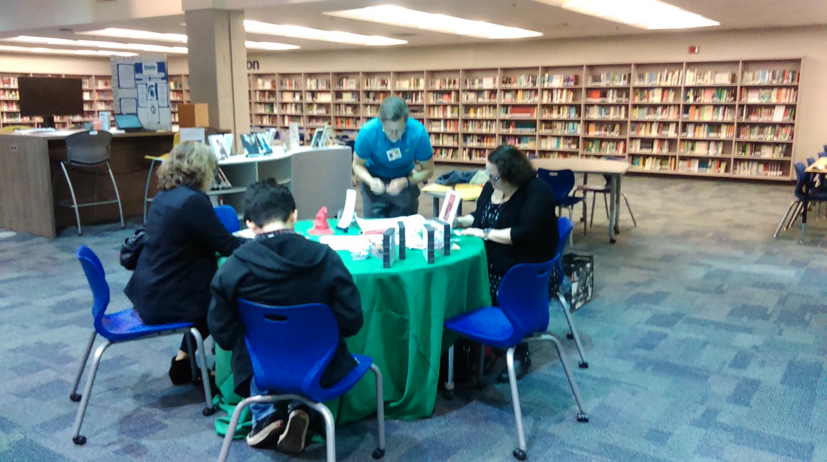 Cobb Public Library visiting our Campbell Library to give library cards to parents and students.