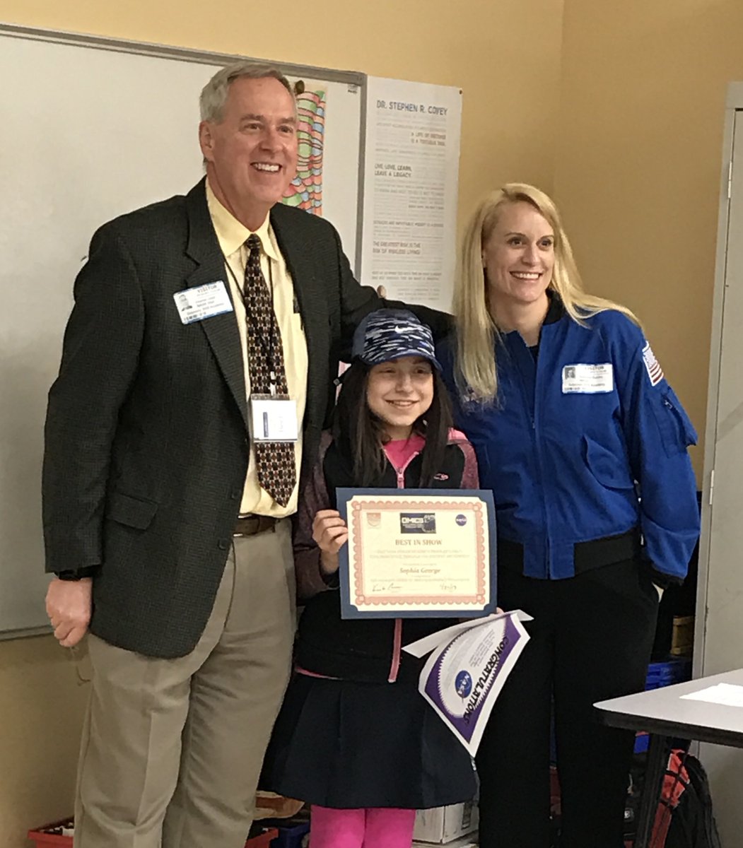 NASAJohnson's tweet photo. Odyssey Academy student Sophia George wins “Best in Show” for omics artwork from Astronaut Kate Rubins https://t.co/rzdfmnWbNu #hrpiws17 https://t.co/GPDWhNcL2L