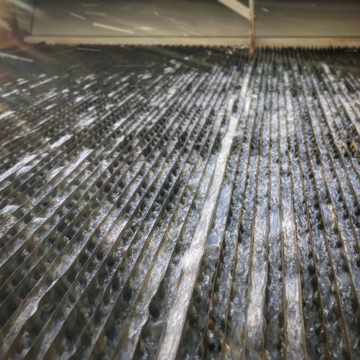balticare's tweet photo. Here's an up close look at #CondenserWater running down through the #fill section of a @CoolingIsBAC induced draft #crossflow #CoolingTower. https://t.co/jP01PTsLyF