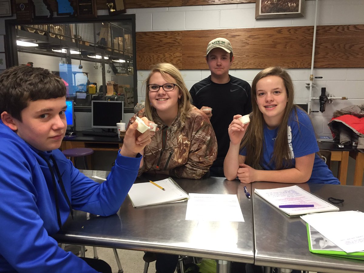 Ms. Smith's Exploring Agriculure class making butter in their dairy unit !