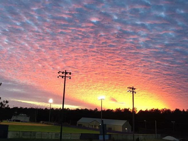 CoachTageant's tweet photo. What a great sunset while finishing up practice yesterday. #demonbaseball #onlyGodcando https://t.co/yOLxJQquij