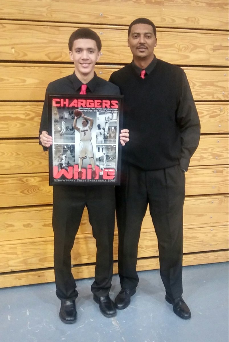 Coach Lewis and <a href="/JordanPW1998/">Jordan White</a> during senior night ceremony