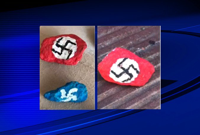 BN9's tweet photo. Investigation underway after swastikas painted on rocks were found outside Muslim-owned store in Lakeland. https://t.co/IH6iBS8r7A https://t.co/LaeblSYEuI