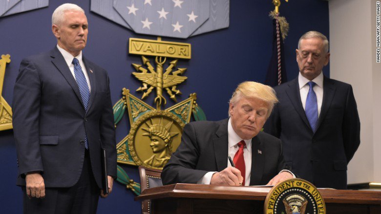 cnni's tweet photo. Jewish groups pan Trump for signing refugee ban on Holocaust Remembrance Day https://t.co/MZ8nqx2tT4 #HolocaustMemorialDay https://t.co/3ndH21Kb72